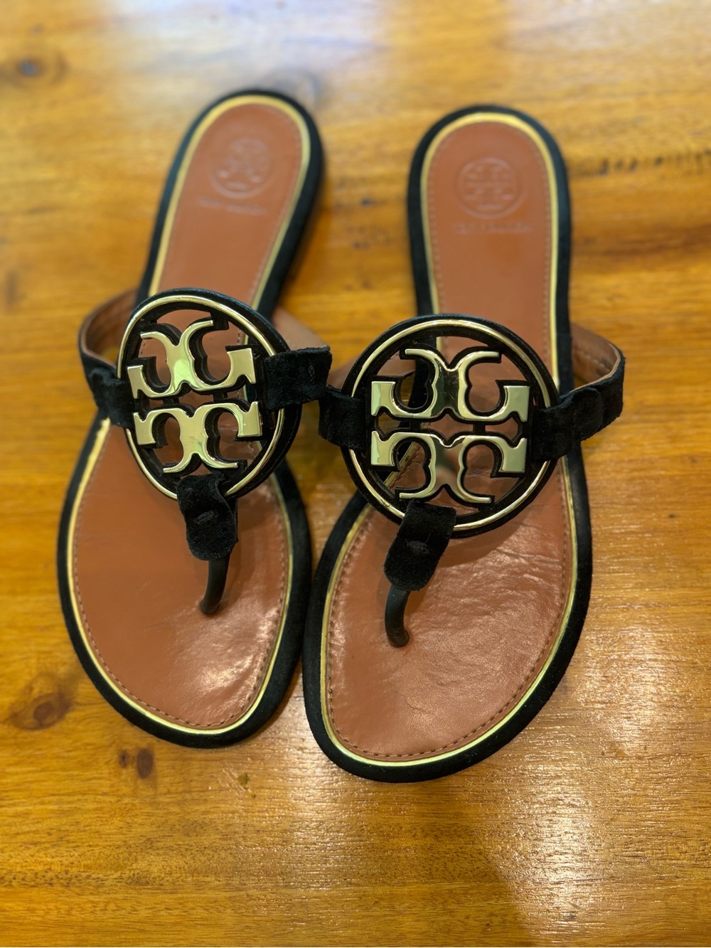Tory Burch Black Suede Sandals with Gold Logo Medallion